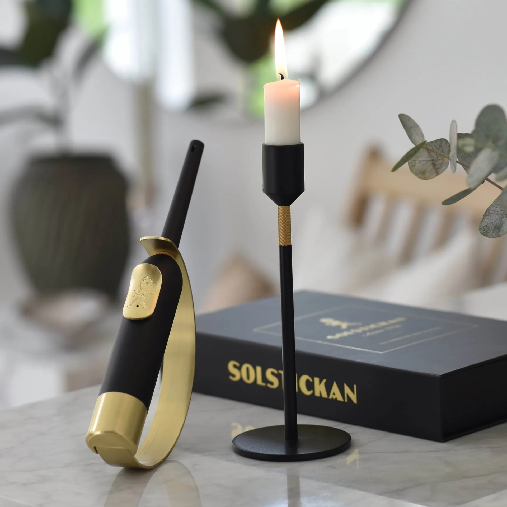 Solstickan eldklinge lighter, Sort-messing Solstickan Design