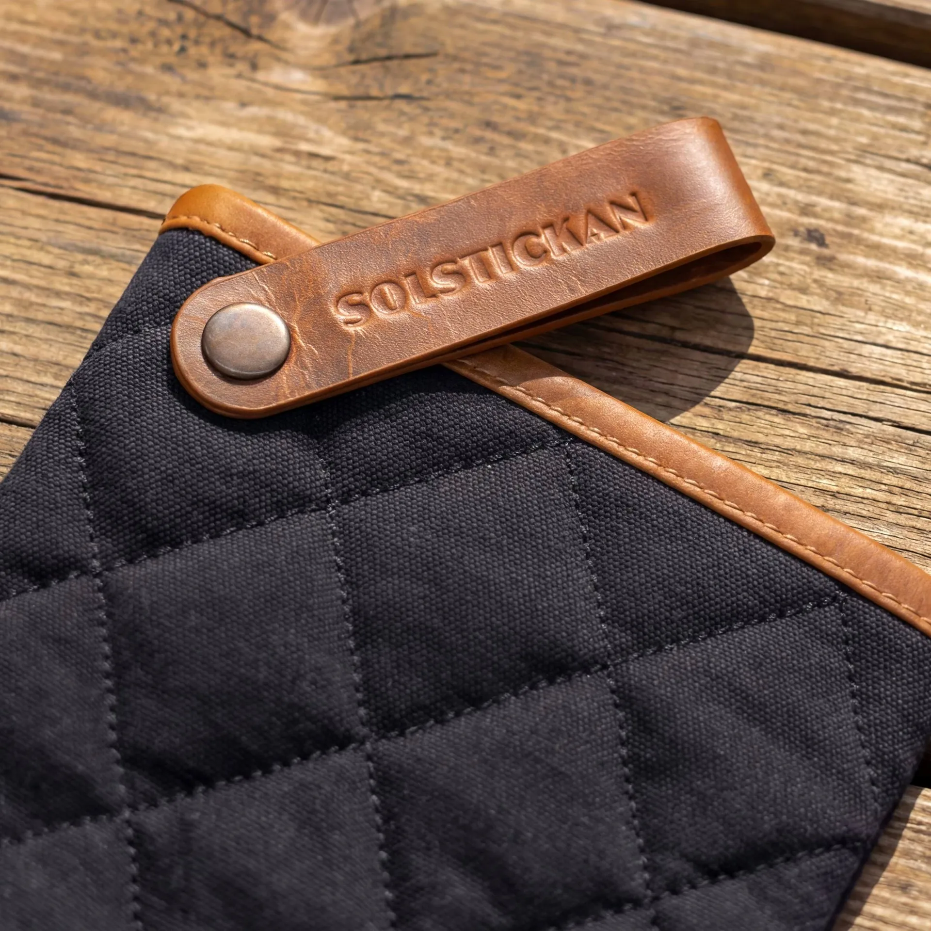 Solstickan grydelap canvas, Sort Solstickan Design